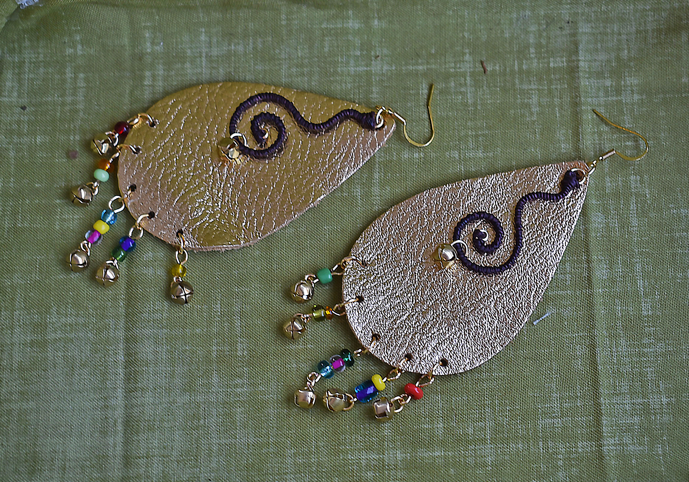 DSC_0870 rainbow earrings laying down