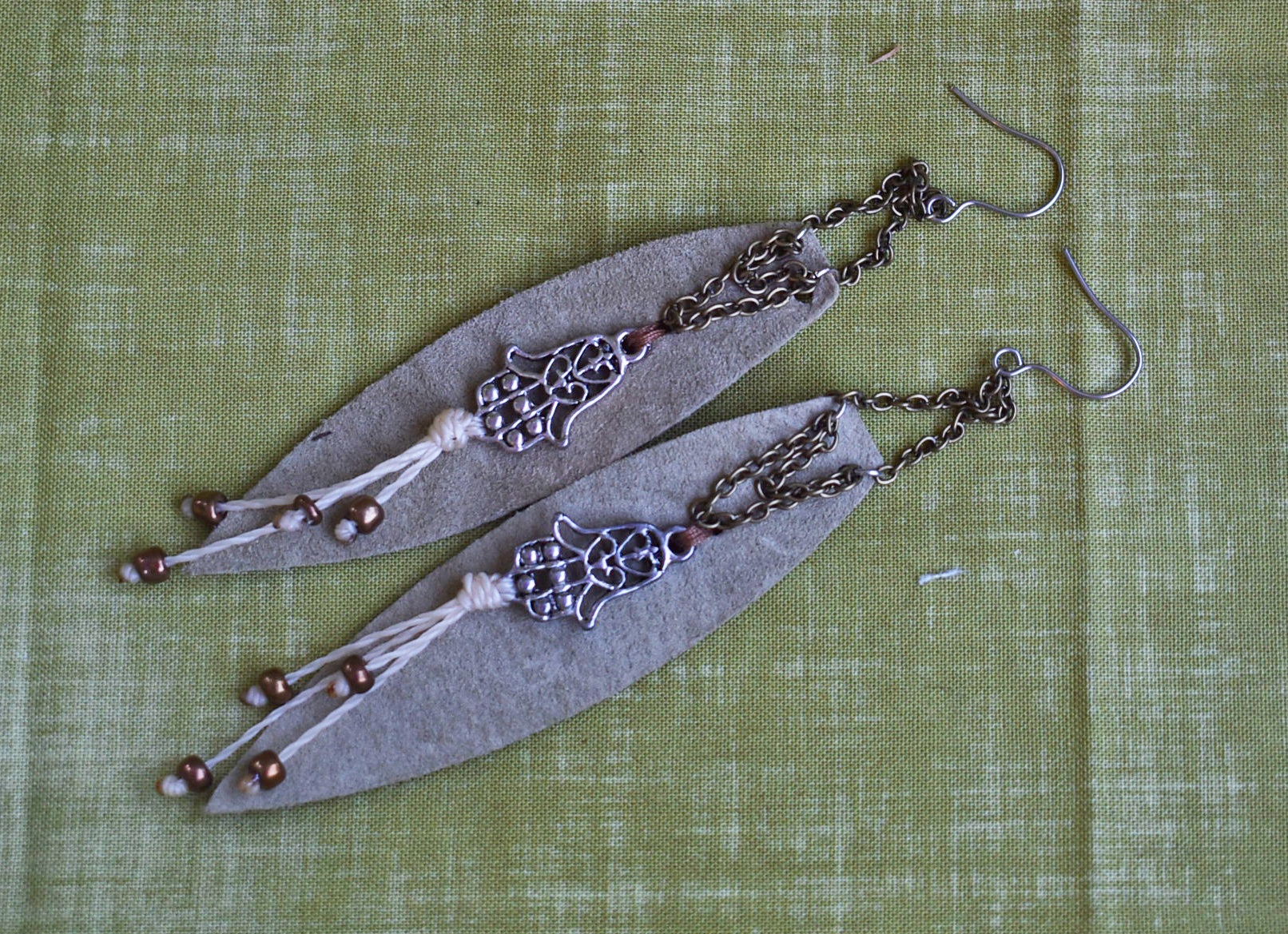 DSC_0894 leaf earrings laying down