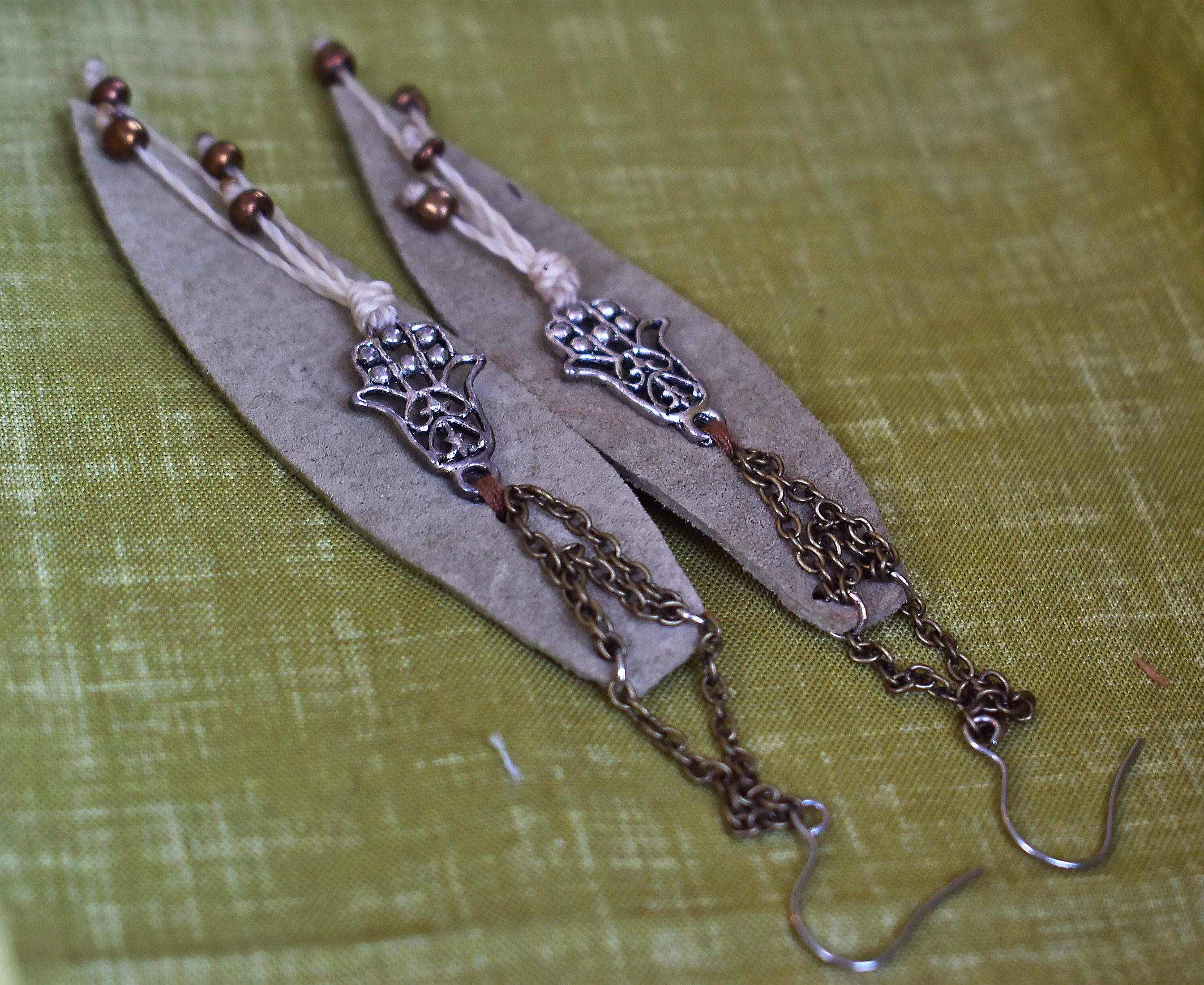 DSC_0899 leaf earrings laying down close up