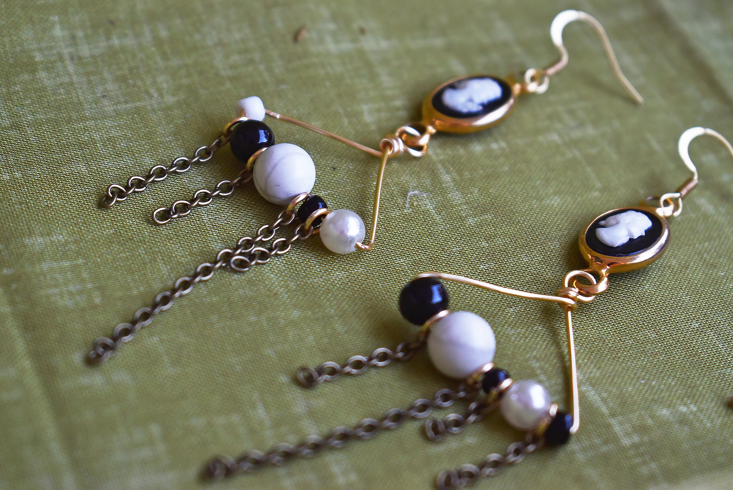 DSC_0963 classy earrings close up laying down