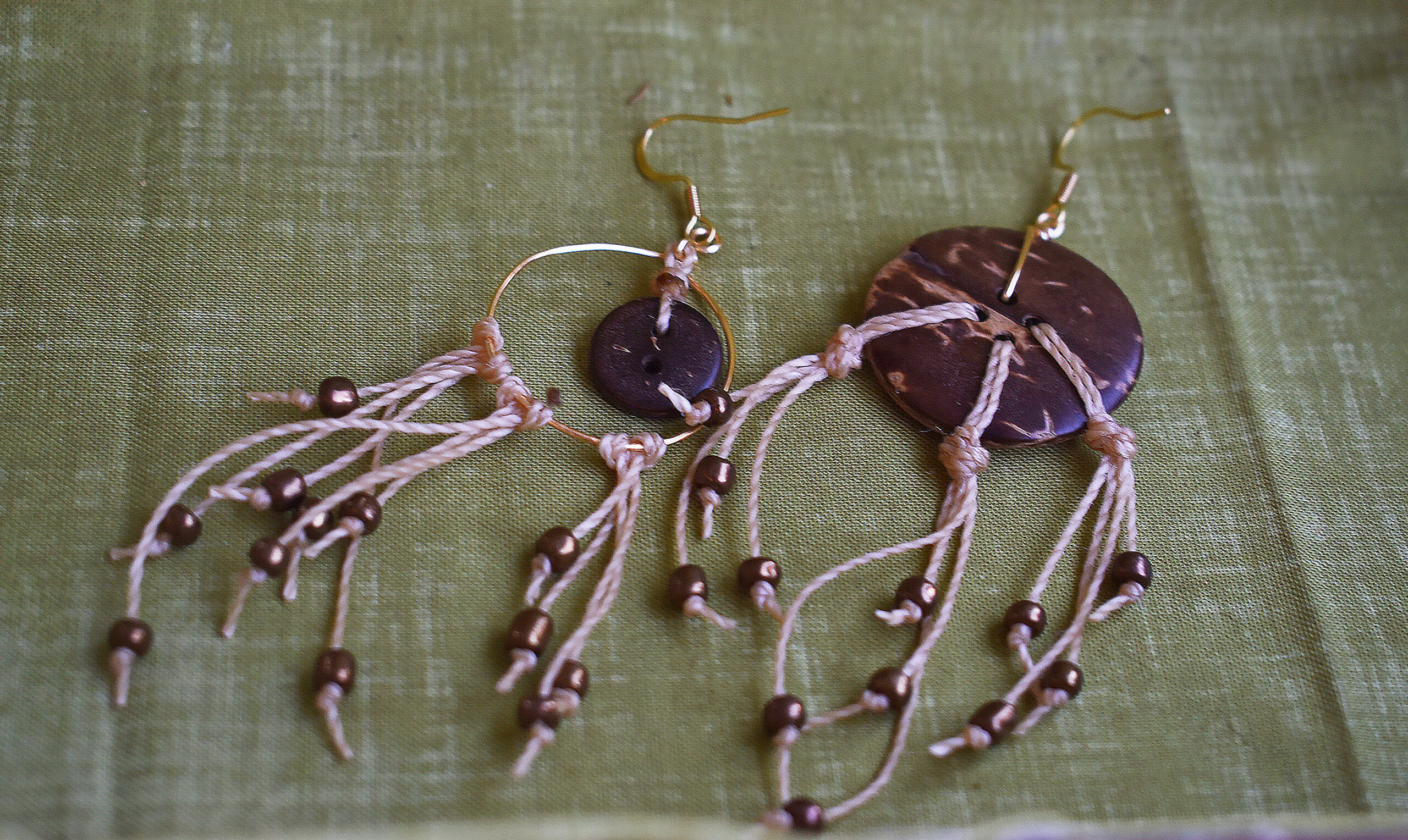 DSC_0965 button string earrings laying down